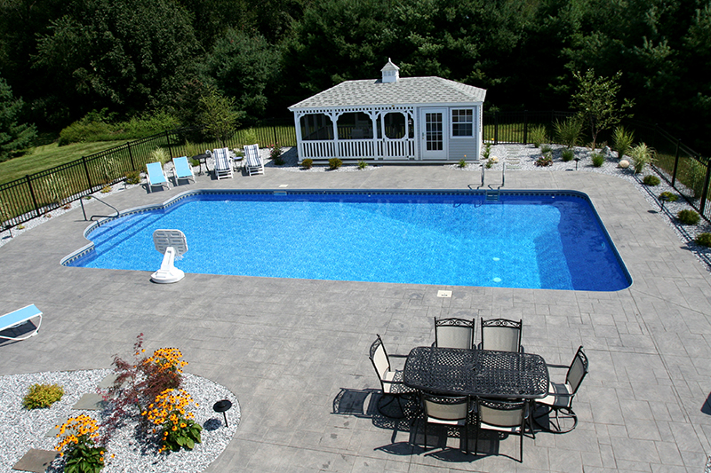 Swimming pool and stamped concrete project example 70